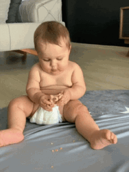 Baby Eating Happily GIF
