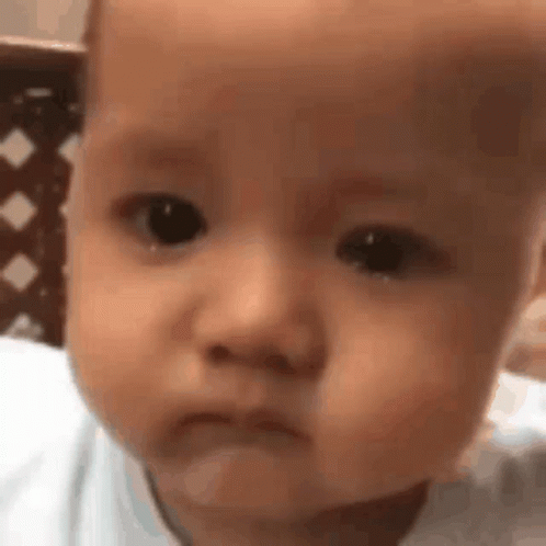 Baby Face With Sad Expression GIF