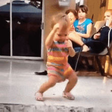 Baby Funny Dance In Front Of Elders GIF