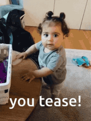 Baby Giggles To Tease GIF