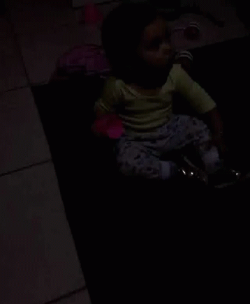 Baby Girl Holding Pink Cup GIF
