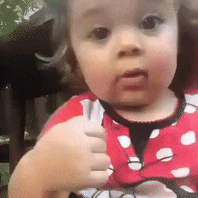 Baby Girl In Minnie Mouse Outfit Thumbs Up GIF