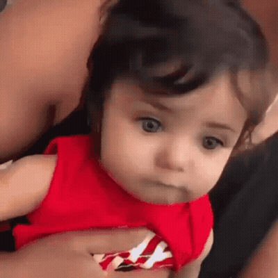 Baby Girl In Red Dress Being Held GIF