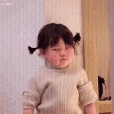 Baby Girl Making Funny Face Holding Ears GIF