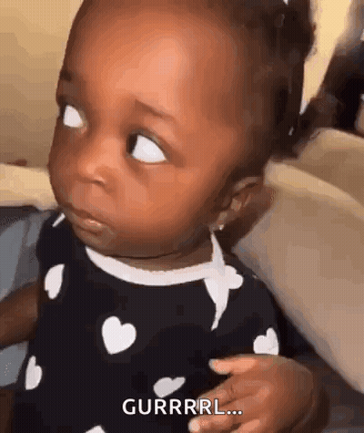 Baby Girl Making Funny Face On Couch GIF