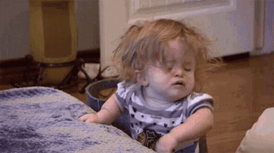 Baby Girl On Couch Eyes Closed Funny Face GIF