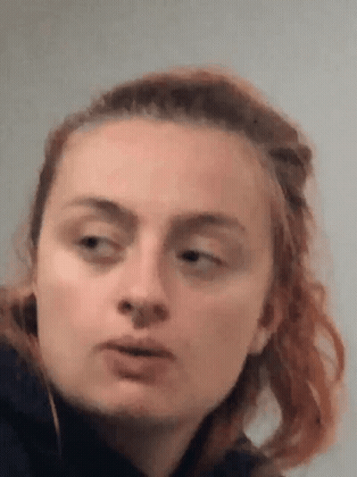 Baby Girl Sitting In Car Seat Making Funny Face GIF
