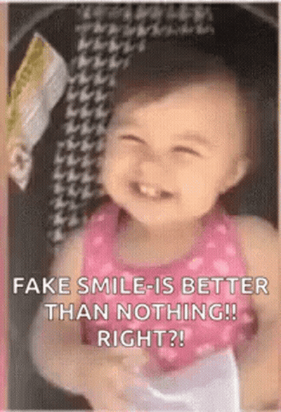 Baby Girl Smiling Holding Book GIF