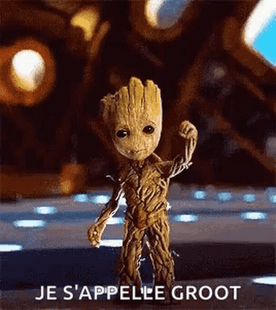 Baby Groot Flexing Muscles In Front Of Building GIF