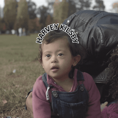 Baby Harvey Kilsby Held By Woman GIF