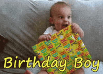 Baby Holding Birthday Present GIF