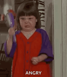 Baby Holding Combs With Anger GIF