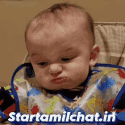 Baby In Bib In High Chair With Starttamilchat.in GIF