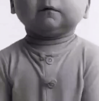 Baby In Black And White Turtleneck Sweater GIF