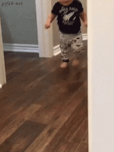 Baby In Black Rock N Roll Shirt Walking GIF
