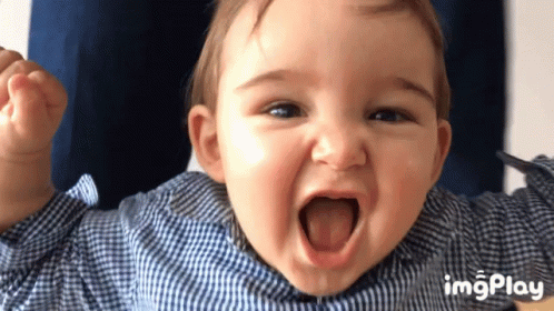 Baby In Blue And White Plaid Shirt Smiling GIF