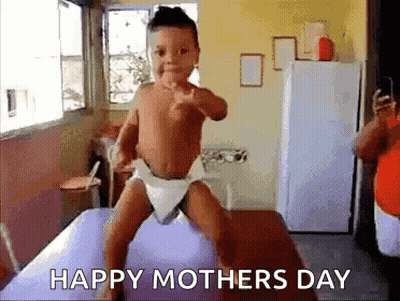 Baby In Diaper Dancing On Table GIF