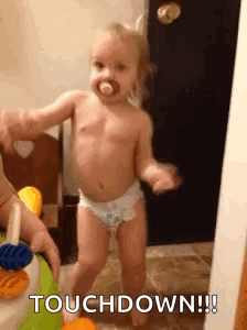 Baby In Diapers Dancing With Pacifier GIF