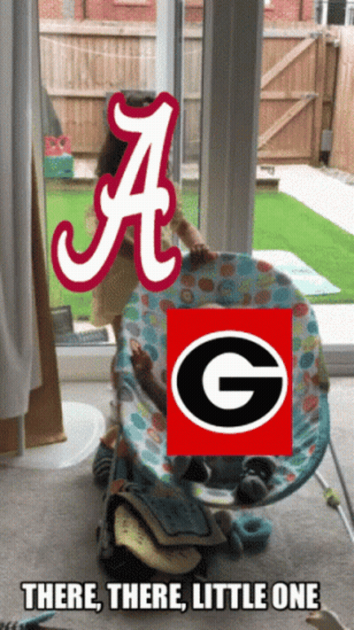 Baby In High Chair With Alabama Logo GIF