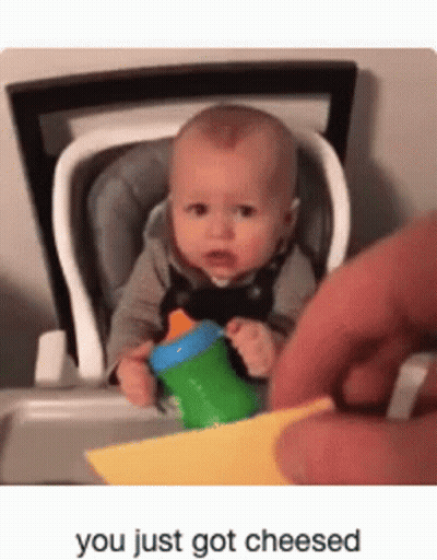 Baby In High Chair With Bottle And Cheese GIF
