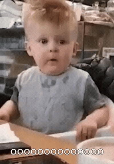 Baby In High Chair With Bowl Of Food GIF