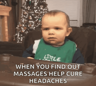Baby In High Chair With Christmas Tree GIF