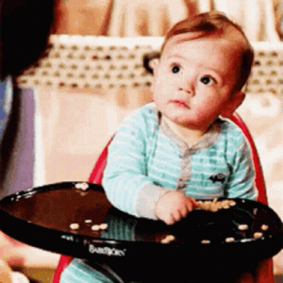 Baby In High Chair With Food Tray GIF