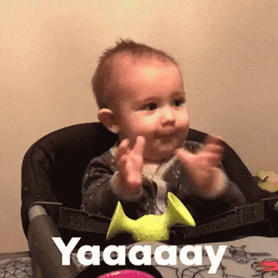 Baby In High Chair With Hands Up Saying Yaaaay GIF