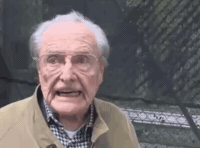 Baby In Penguin Shirt Giving Fist Bump GIF
