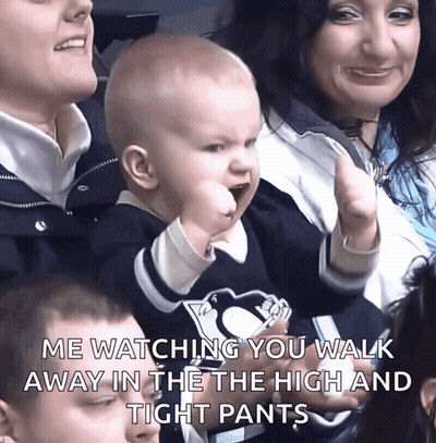 Baby In Penguin Shirt Giving Fist Bump GIF
