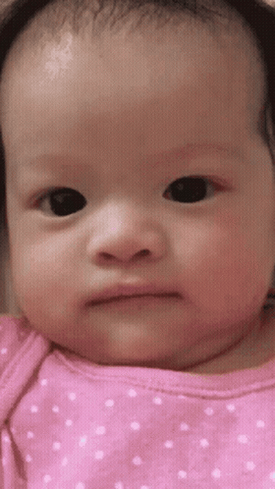 Baby In Pink Polka Dot Shirt GIF