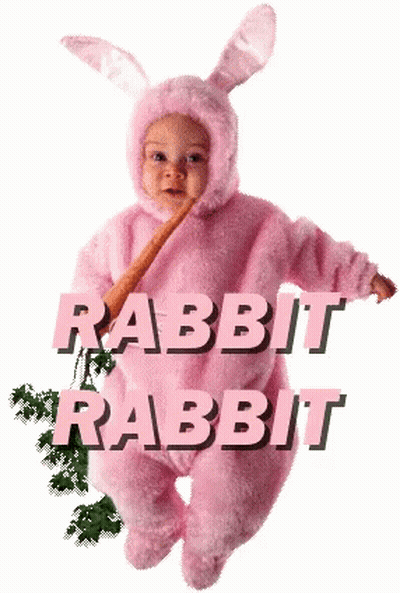 Baby In Pink Rabbit Costume Holding Carrot GIF