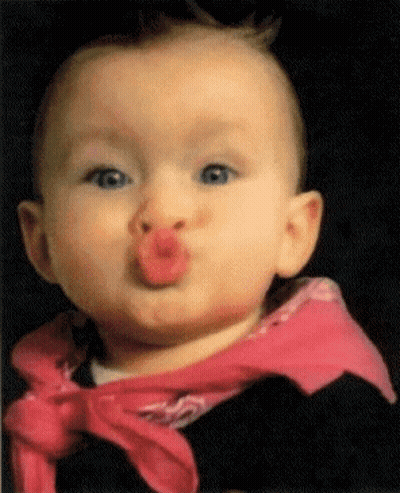Baby In Pink Scarf Blowing A Kiss GIF