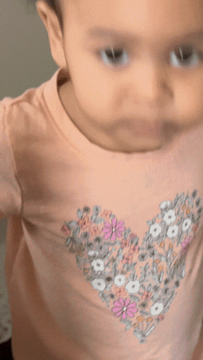 Baby In Pink Shirt With Heart GIF