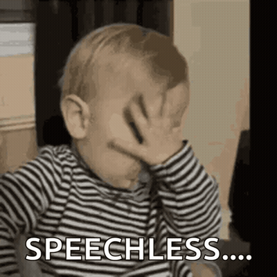 Baby In Striped Shirt Covering Face Speechless GIF