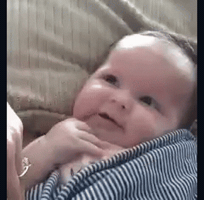 Baby In Striped Shirt Held Smiling GIF