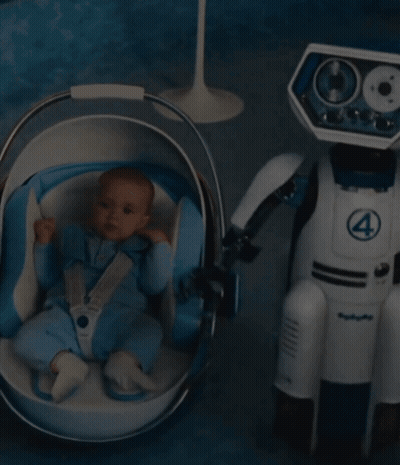 Baby In Stroller Next To Robot With Number 4 GIF