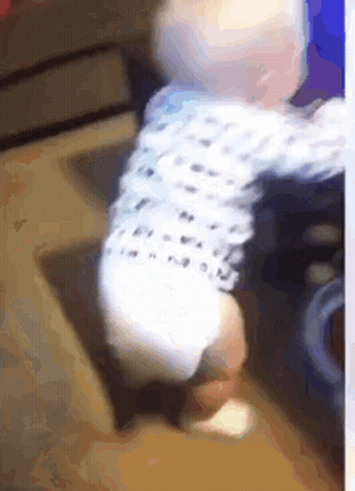 Baby In White Polka Dot Shirt Walking GIF