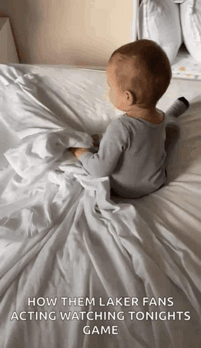 Baby Laying On Bed How Them Laker Fans Acting Watching Tonights Game GIF