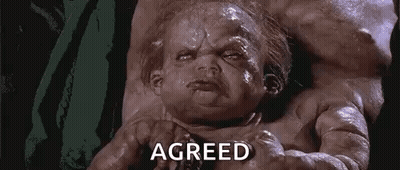 Baby Laying On Bed Saying Agreed GIF