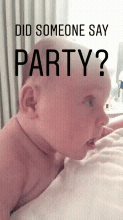 Baby Laying On Bed Saying Did Someone Say Party GIF