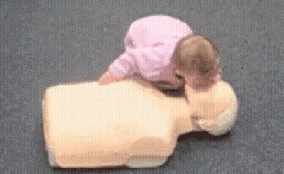 Baby Laying On Life Preserver GIF