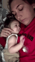 Baby Lying On Mom GIF