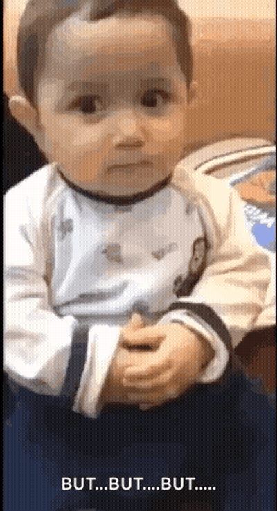Baby Making Funny Face Holding Hands GIF