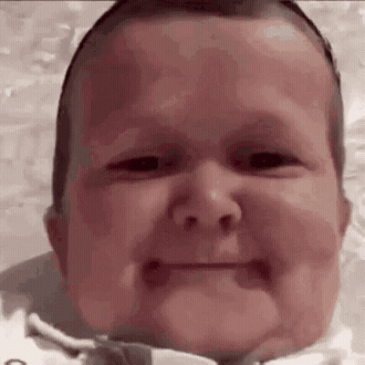 Baby Making Funny Face GIF