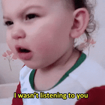 Baby Making Funny Face Saying I Wasn't Listening GIF