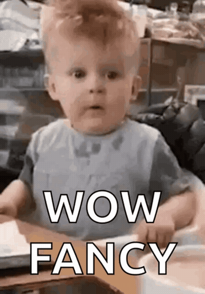Baby Making Funny Face Saying Wow GIF