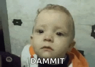 Baby Making Funny Face Says Dammit GIF