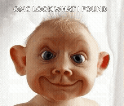 Baby Making Funny Face With Big Smile GIF