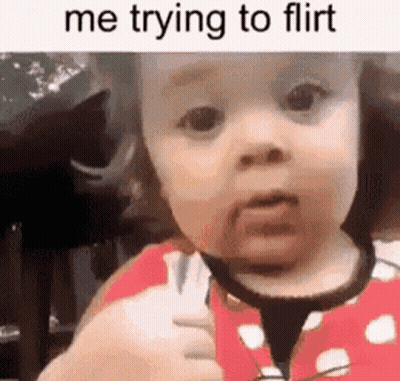 Baby Making Funny Face With Cat GIF
